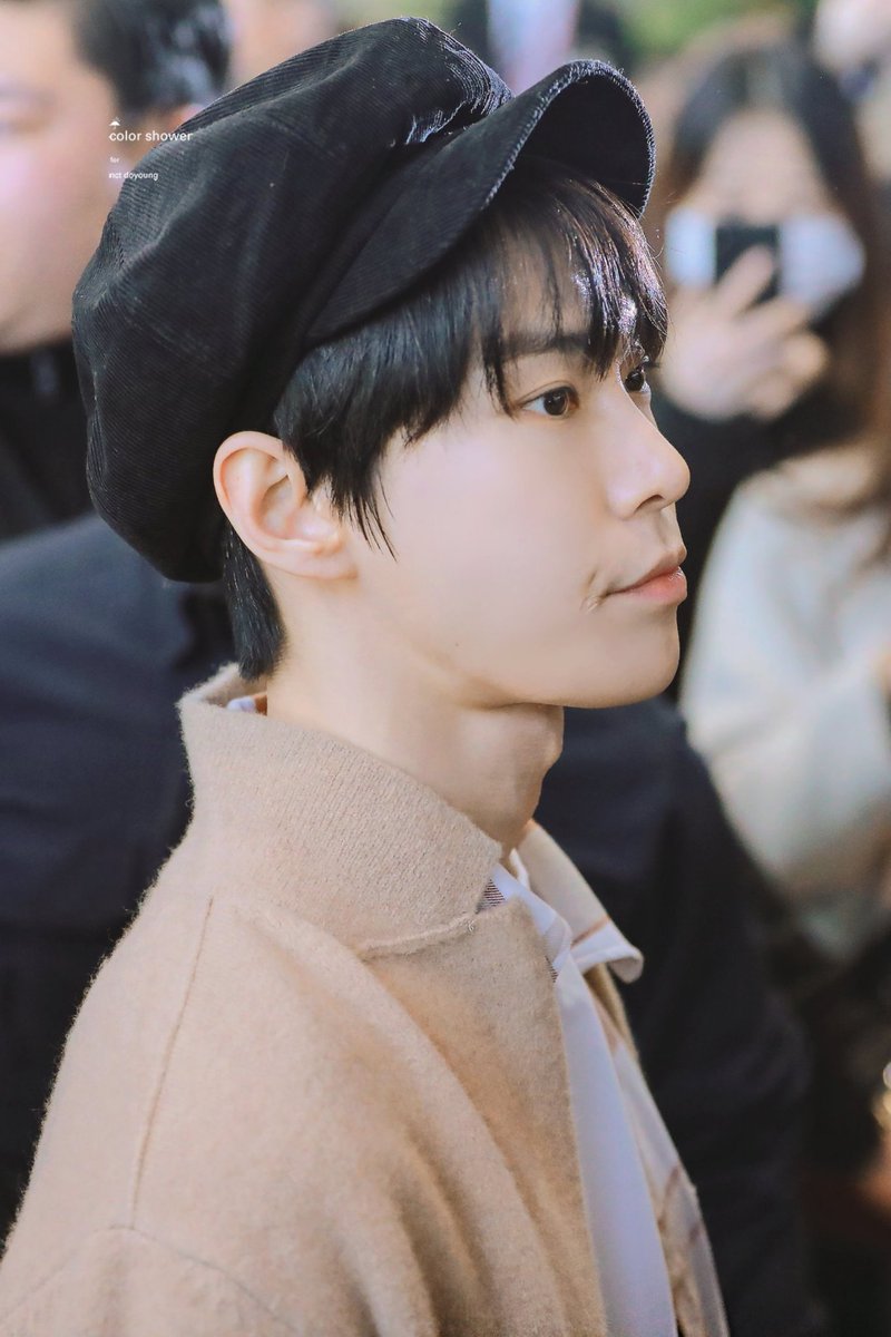 doyoung (nct) and the roundish scar in the right corner of his mouth