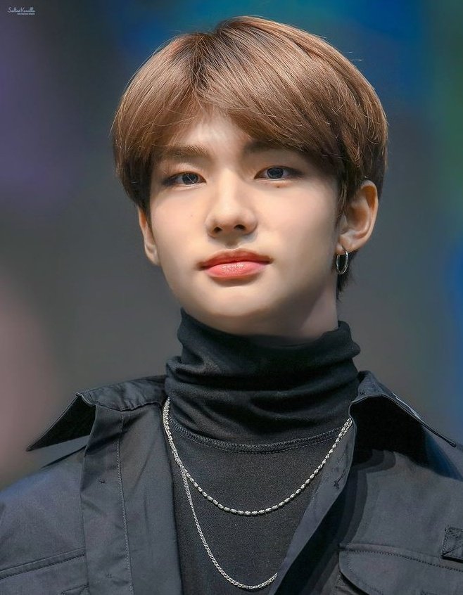 hyunjin (stray kids) and the moles on his face, notably under his left eye