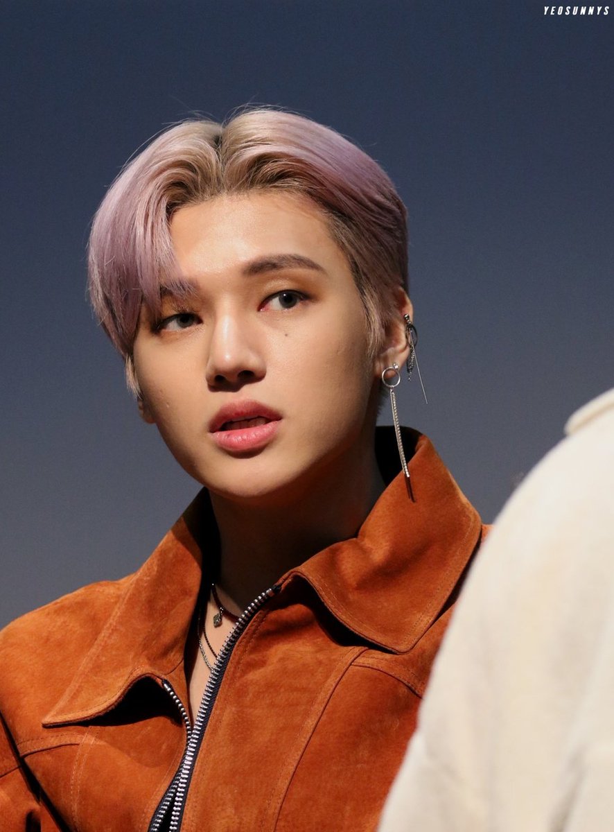 wooyoung (ateez) and the moles under his left eye and on his lower lipalso: small scars including twin ones on his cheek