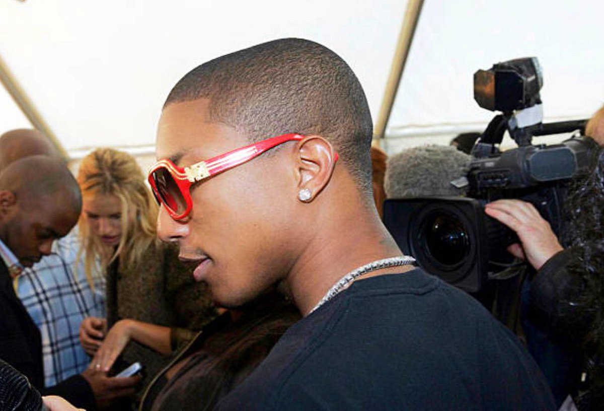 Pharrell and Vashtie arriving the Louis Vuitton by Marc Jacobs Spring/Summe...
