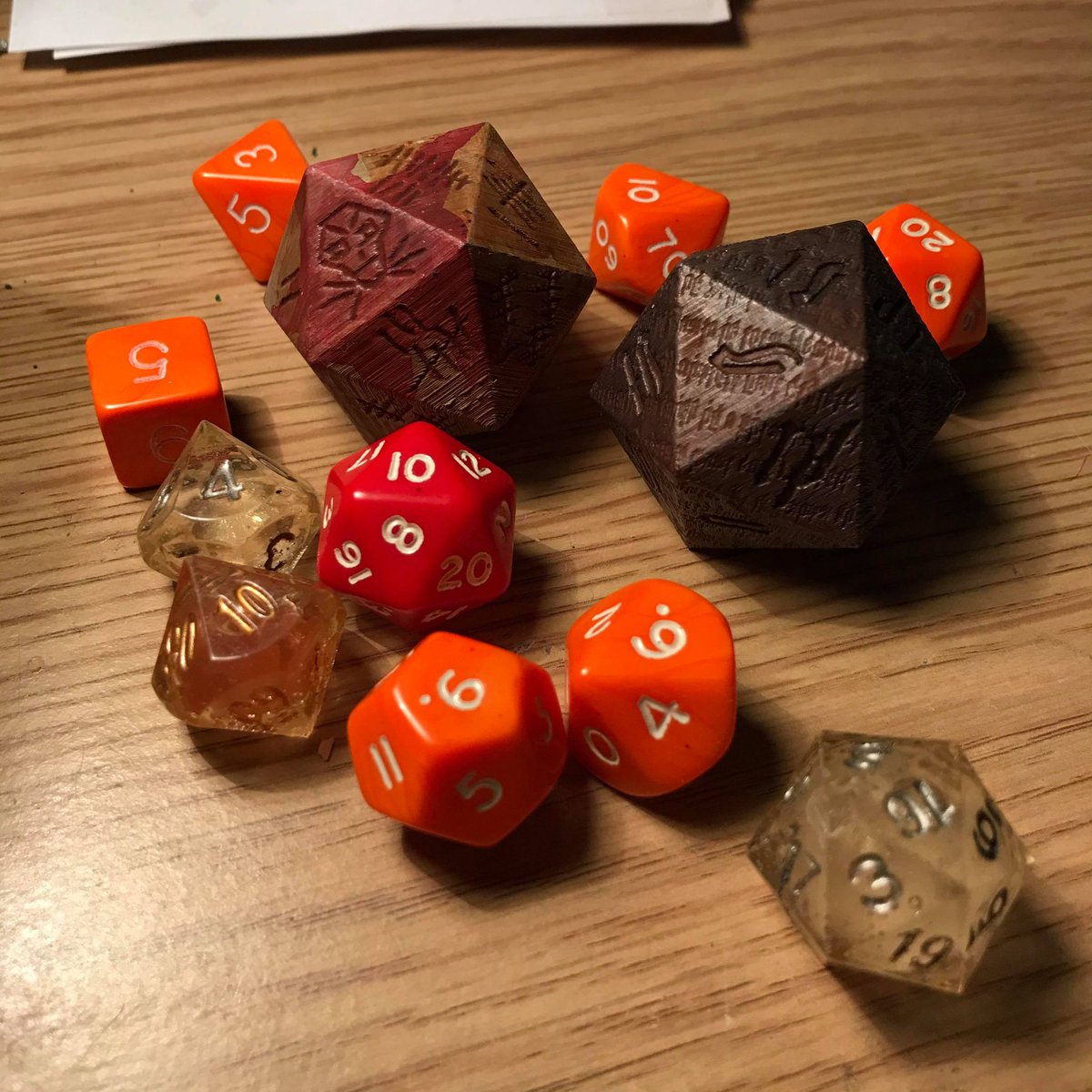 PluckyGameDev's tweet photo. Dabbling in dice designing, Barbarian Rage tally die and Warlock Infernal Contract die* (uses the actual infernal font) *always read the fine-print #dice #DnD https://t.co/xg2vpOA9FR