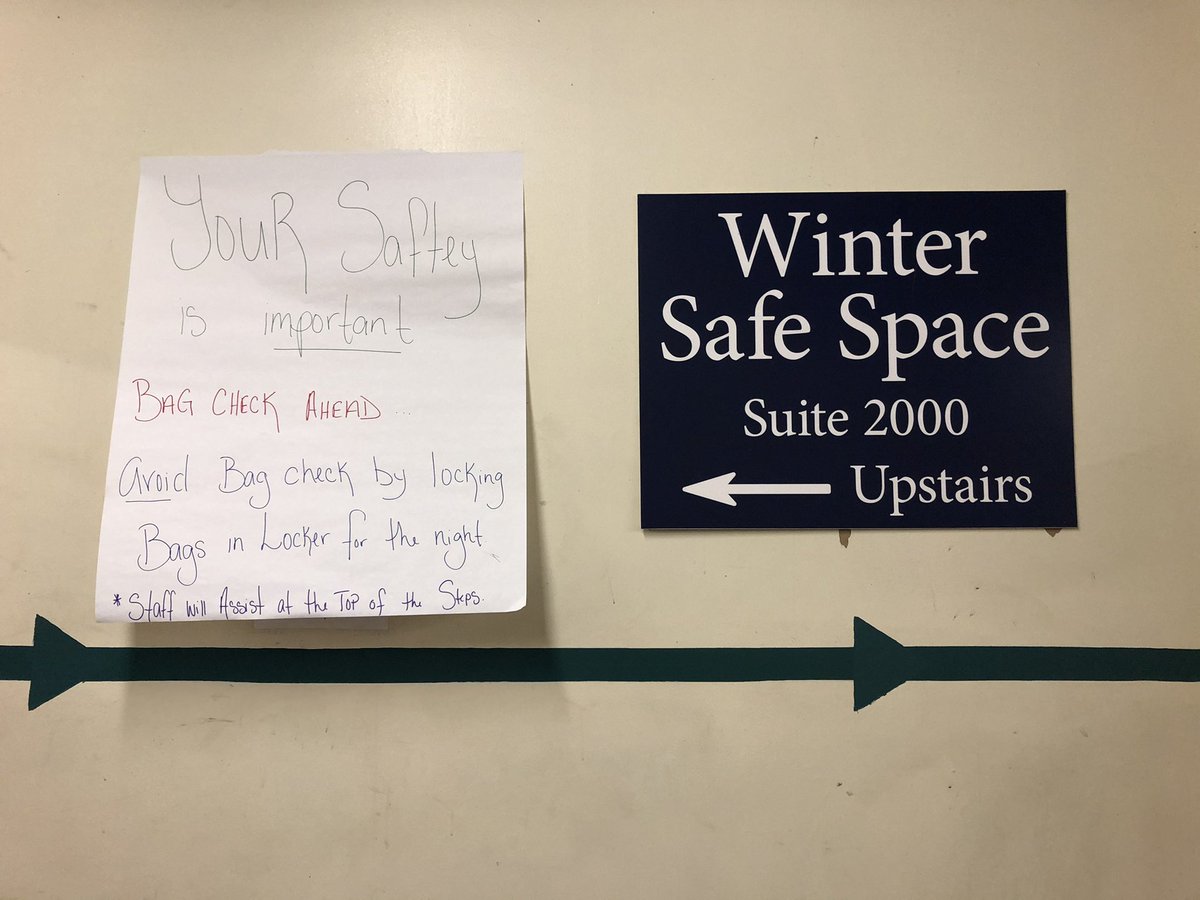 Once folks are checked in from the referral list/temp check/given a mask they head upstairs through this hallway and do a bag check