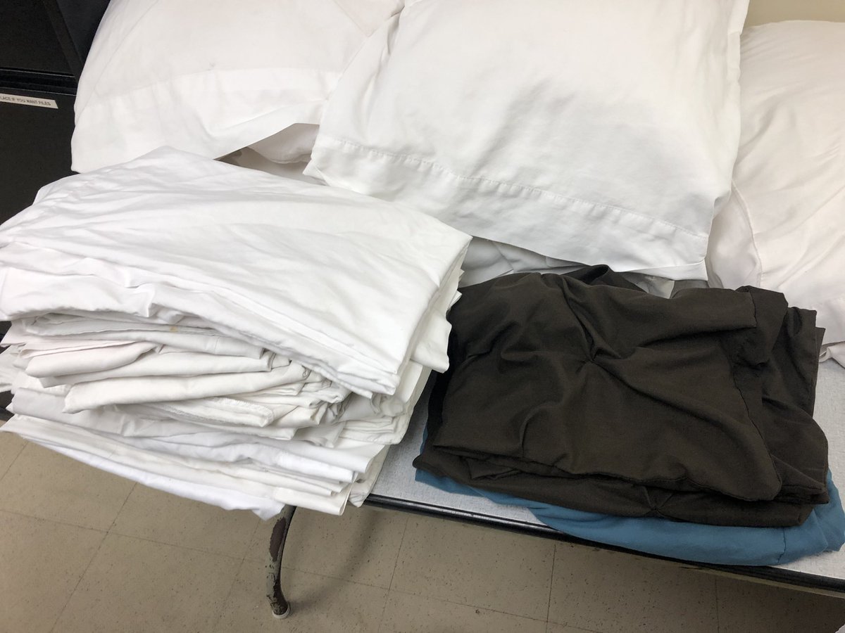 Throughout the night I’ll try to share pictures as able/appropriate. First task up, prepping 64 beds worth of re-sanitized and freshly laundered bedding. This is the clean pillowcase pile I’m adding to