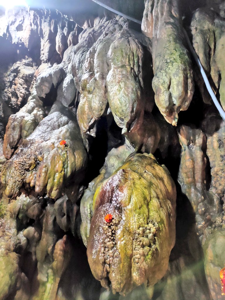 Then comes the holy cave of Nau Deviyan. Devotees have to crawl through the narrow entrance.The Darshan of holy cave is divinely and I couldn't believe my eyes cave looks like Nag devta's.On the left side on entering the Holy cave is Pindi of Lord Ganesha.Footprint of Devi Maa