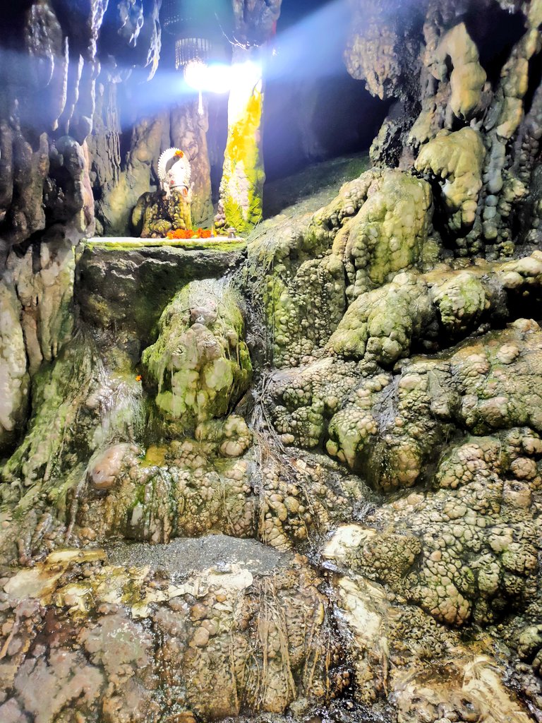 Then comes the holy cave of Nau Deviyan. Devotees have to crawl through the narrow entrance.The Darshan of holy cave is divinely and I couldn't believe my eyes cave looks like Nag devta's.On the left side on entering the Holy cave is Pindi of Lord Ganesha.Footprint of Devi Maa