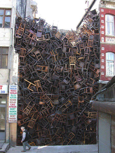 Colombian artist Doris Salcedo, installation, Istanbul Biennial, 2003, over 1600 chairs, urban art  project #womensart