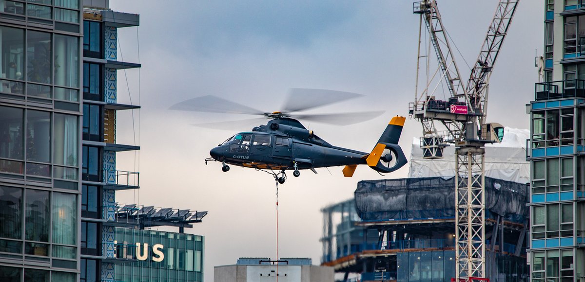 Kent_YVR's tweet photo. As promised 😉 Photos from the good camera of @taloncopters Eurocopter #AS365 Dauphin lifting HVAC equipment today in downtown #Vancouver 😎 @jarrettlunn #yvrspotters #helicopter #CGTLW https://t.co/mVUpe7K7Ah