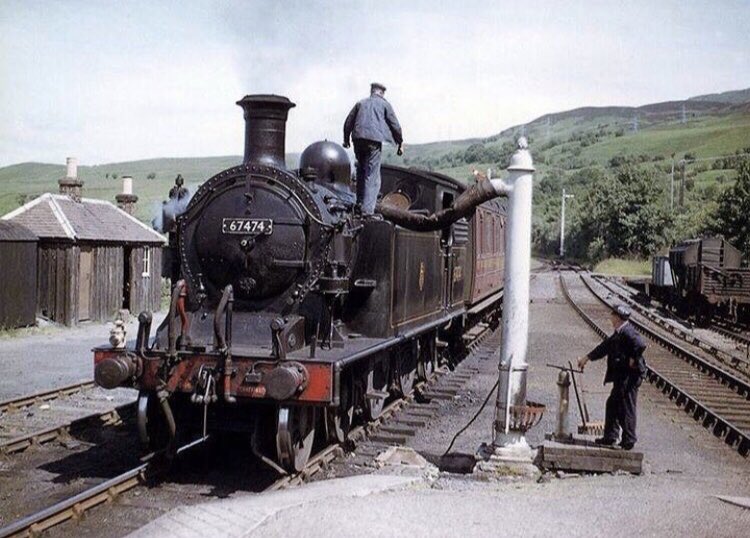 17/ most people think of double headed powerful locomotives on the West Highland Line, however, in this picture a small tank engine takes on water at Garelochead for a push pull Criagendoran-Arrochar and Tarbet service.