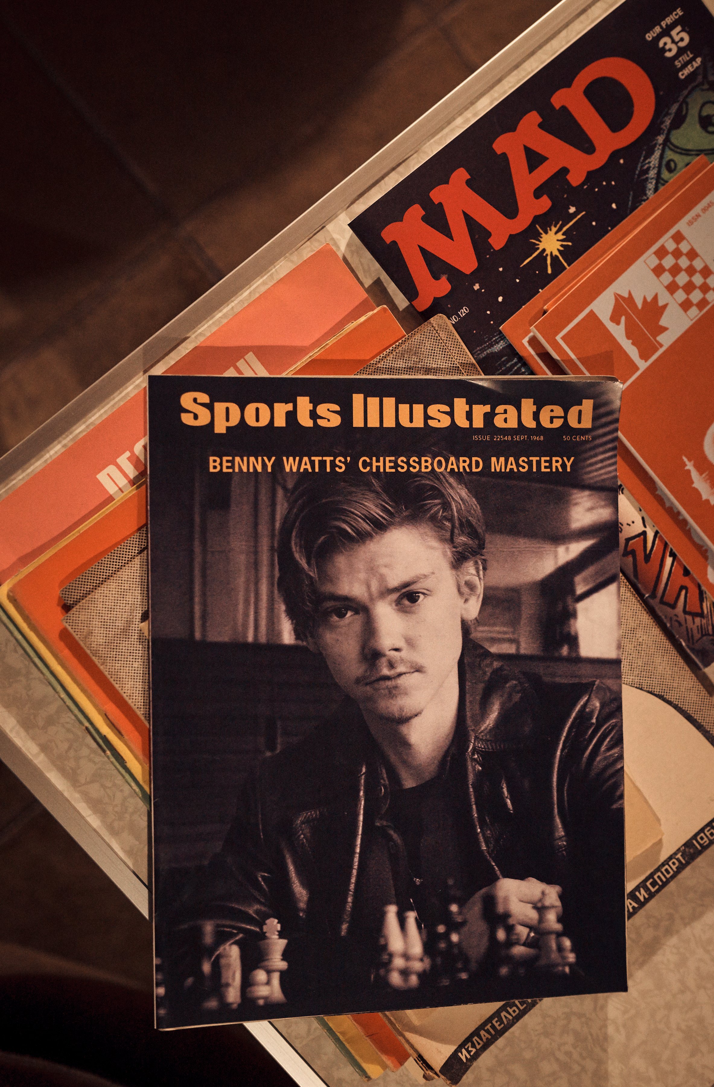 Close-up of Thomas Brodie-Sangster as Benny Watts on the cover of