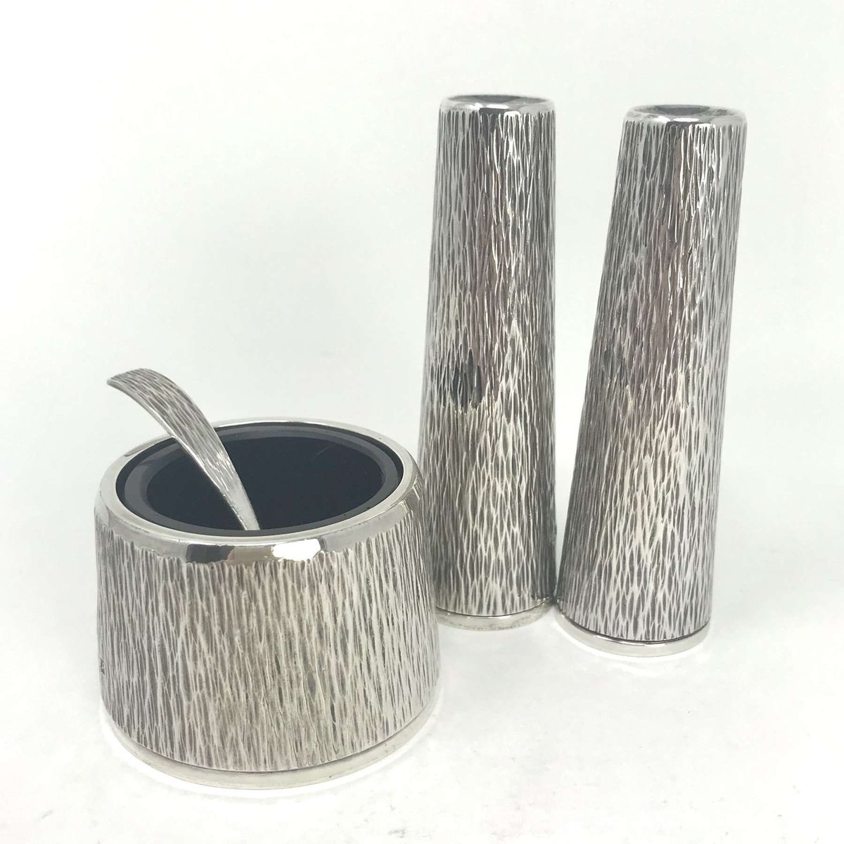 Haresfur1's tweet photo. A great piece piece of English modernist design this silver cruet set was designed by Christopher Lawerence for C J Vander hallmark for 1970. For sale on our website. Thanks to @DrewPritchard for #salvagesundays https://t.co/e32Q8jQW5T