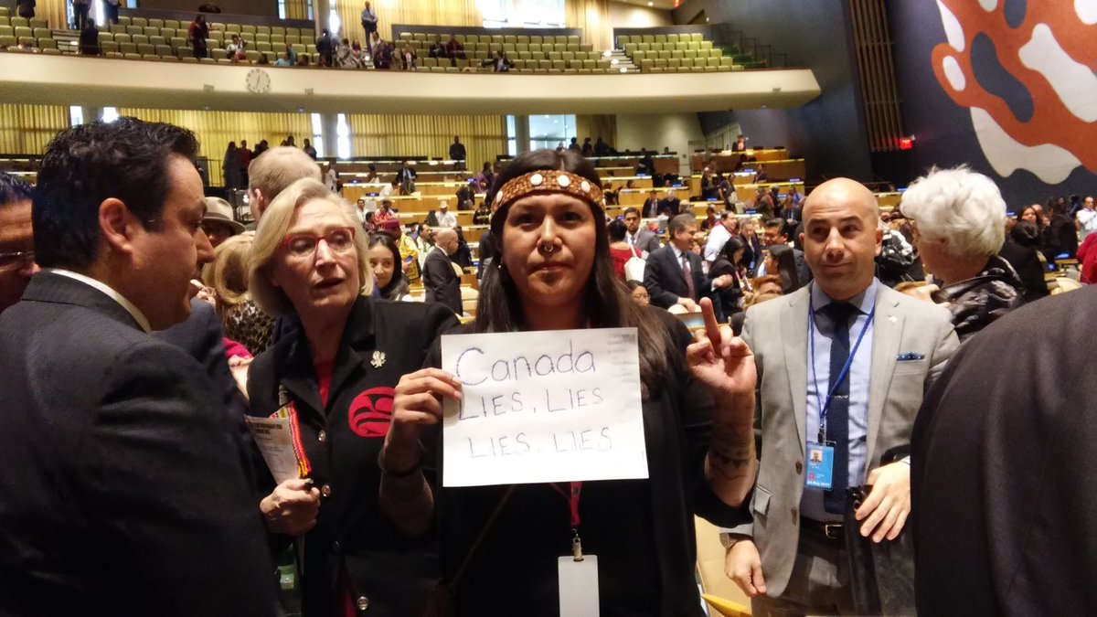 RussDiabo's tweet image. In 2016, at UN feds INAC Minister, Carolyn Bennett, announced qualified support 4 UNDRIP via Canadian definition (Nat’l Termination Plan), in 2017 at UN @KanahusFreedom unmasks Bennett &amp;amp; in 2018 Trudeau gov’t announces federal purchase of Kinder Morgan Pipeline ignoring FPIC!