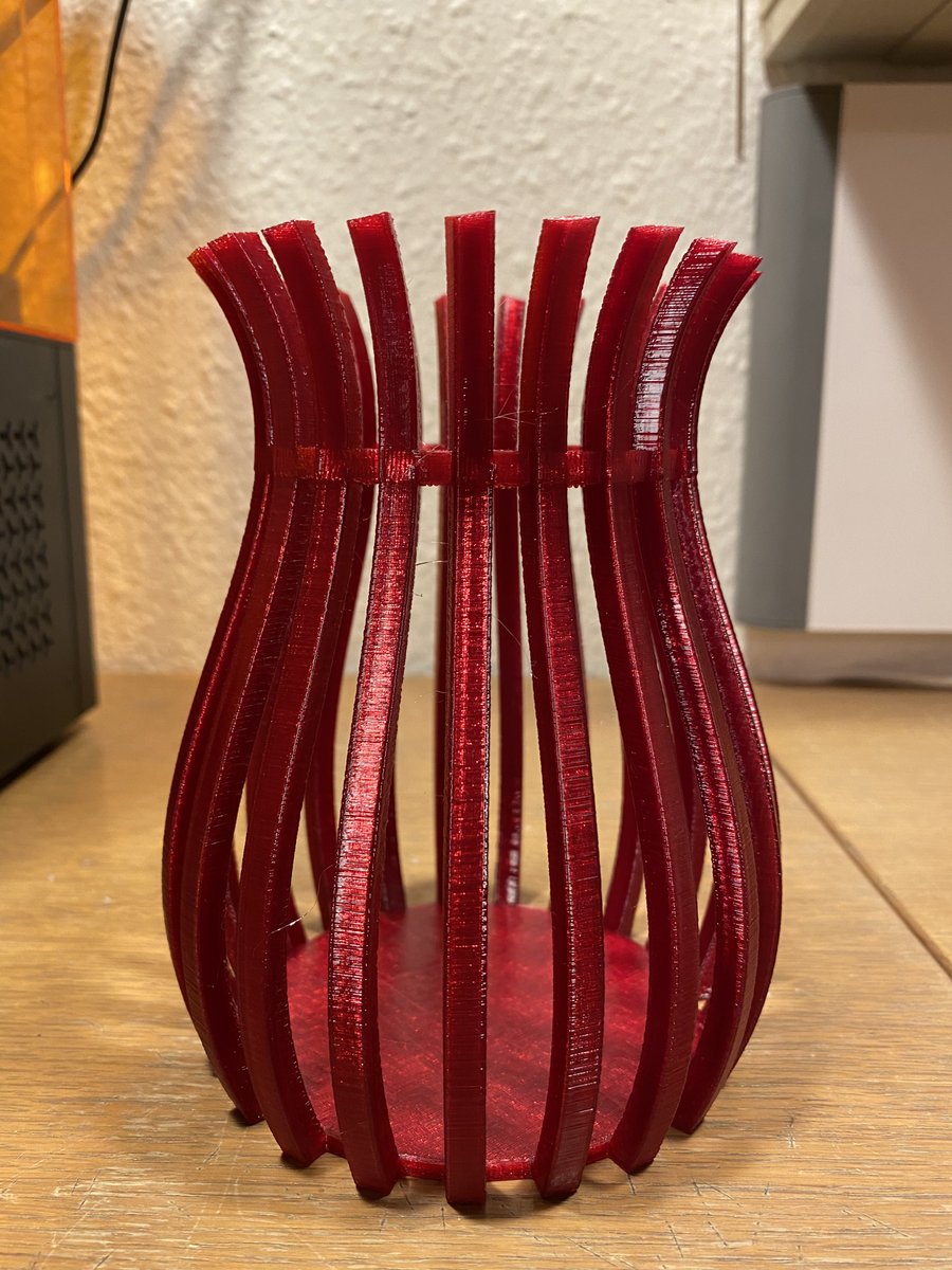 pisarm's tweet photo. Made a Stubby vase in Fusion 360, first print of the model in transparent red @Fiberlogy EASY PET-G. 

Model freely available here: https://t.co/qMxeWwVjQU https://t.co/2F0NkKyElr