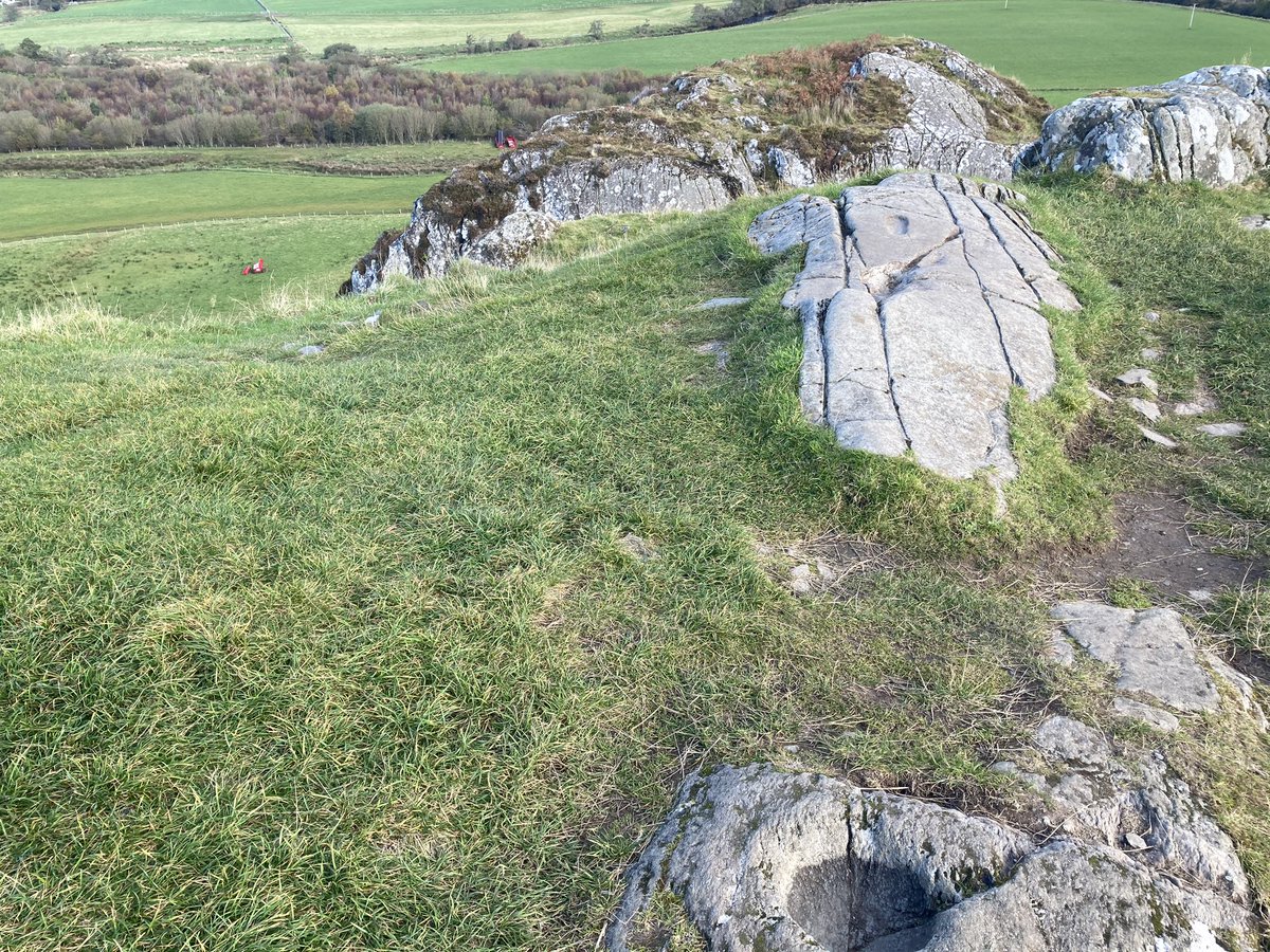 At the top of Dunadd is the inauguration stone with footprints & carvings including a boar. Here the Gaelic kings were symbolically married to the land they were to rule. A large bowl has been carved into the rock next to the stone & may have been a part of the kingship rituals