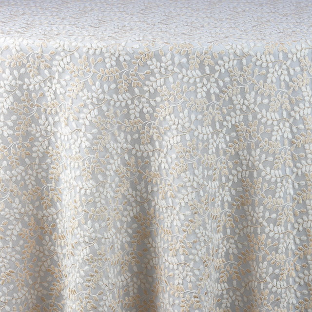 Ali Sheer Ivory/Gold is  an embroidered overlay with petit petals and hints of soft gold.
.
.
#linen #boutiquestyle #boutiquelinen #eventrentals #events #ncevents #northcarolina
