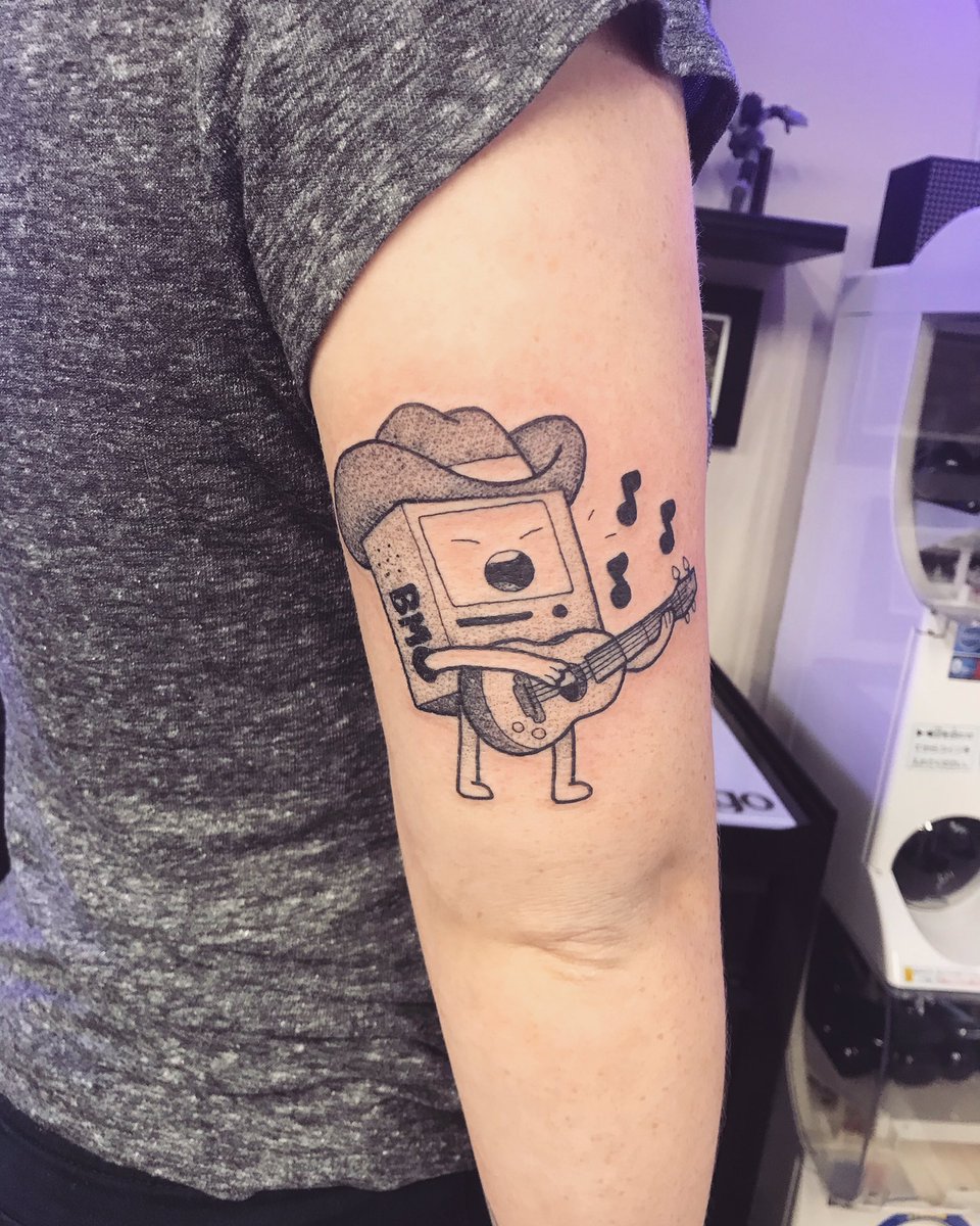 Corey on X: "Anyways, here's my new tattoo that I love and am sharing to every social media platform #AdventureTime #BMO #tattoo https://t.co/dHQ88G52s5" / X