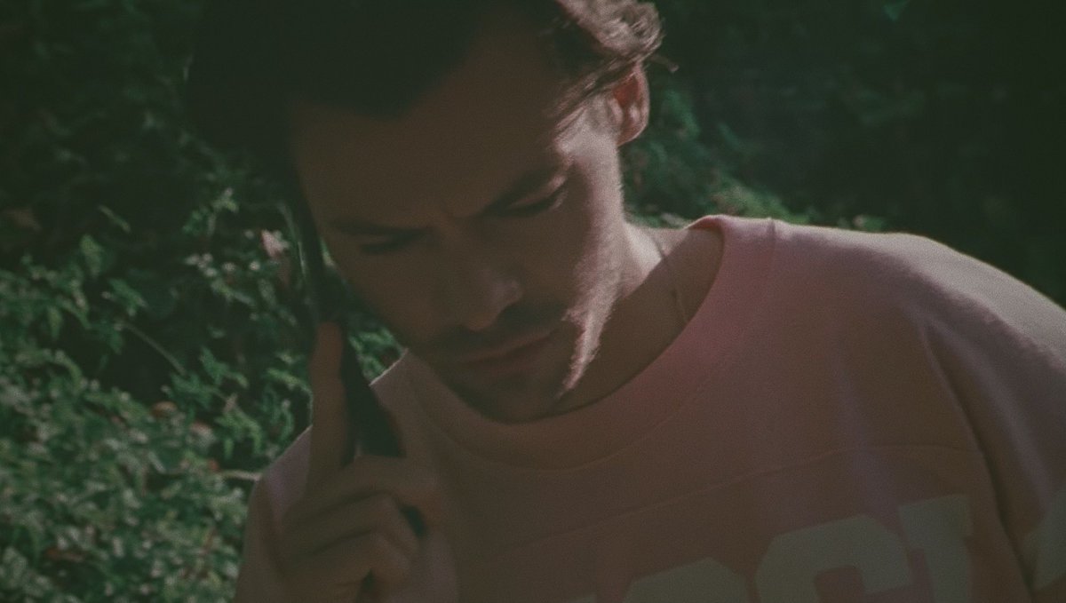 harry styles on the phone but taken on a disposal camera ; a thread