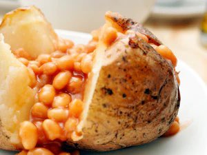 The #Jacket #potato is a #baked #potato with all the #skin and #engraved cross, in the incision is melted a #piece of #butter.