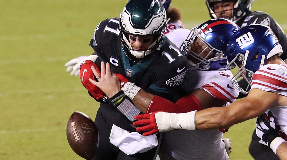 NFLonCBS's tweet photo. Carson Wentz leads the NFL in BOTH interceptions (14) AND fumbles (10). https://t.co/fjD9cOwG8o