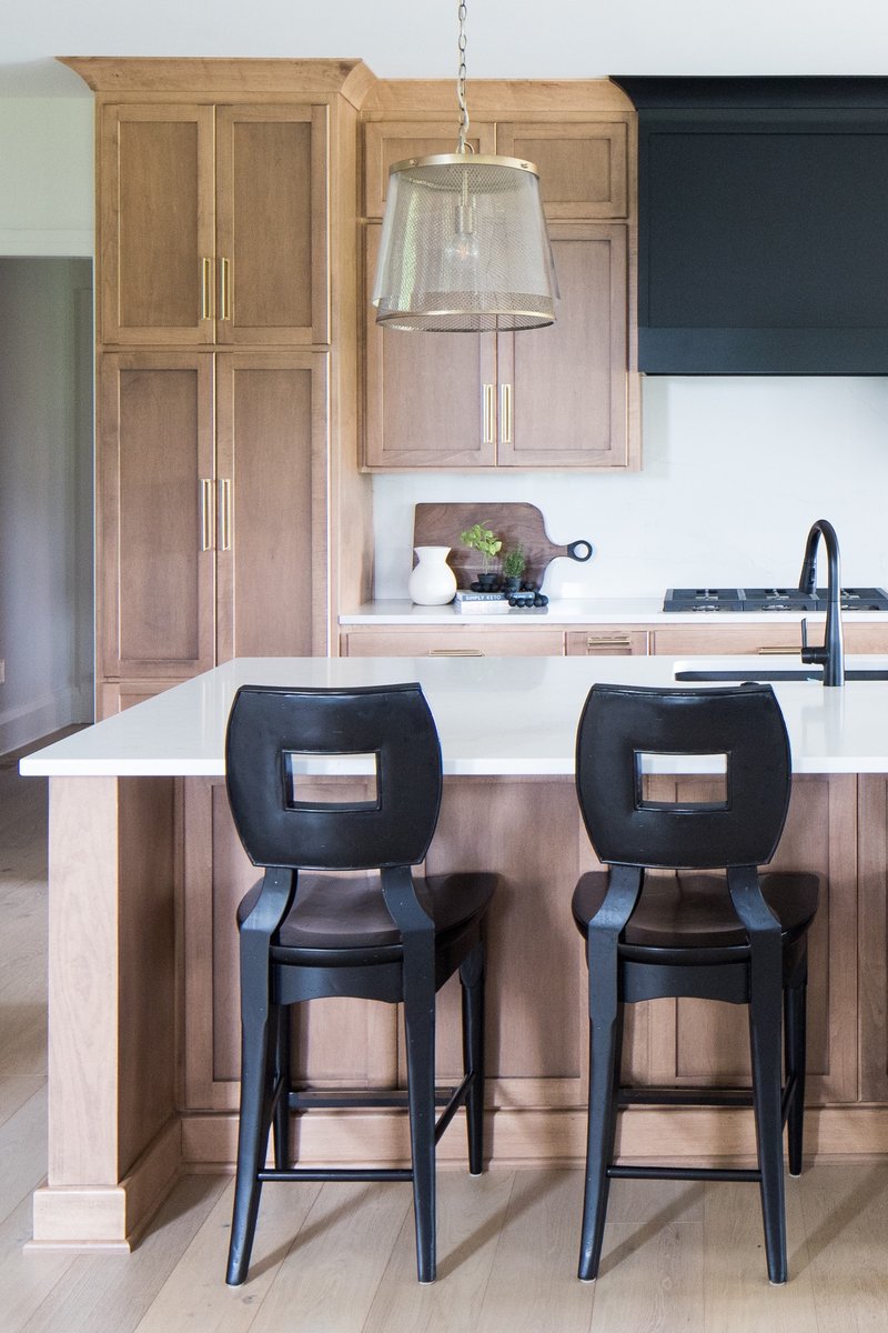 Island time 🤙🏼 
⠀⠀
Design: @coomerandco 
Photography: <a href="/kristen/">Kristen Hilderman</a>.mayfield 
Contractor: @dougmconstruction 
#coomerandco #bghomefurnishings #sugargrovemarble #creativewooddesigns #capitallighting #deltaplumbing #kitchen #ipreview via @preview.app