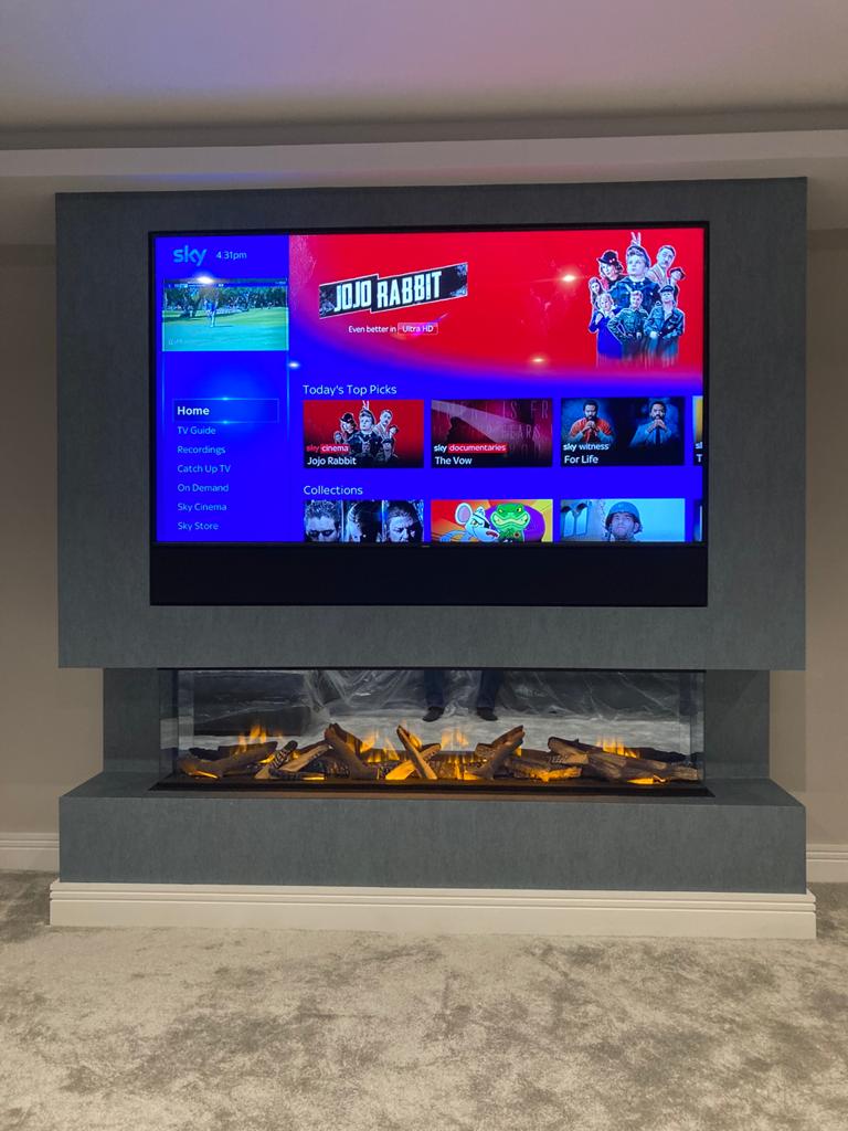 CleerVu's tweet photo. 🔥Our latest bespoke TV &amp; fire wall.
🖥Samsung 75” Qled UHD TV wall mounted with a Sonos Arc soundbar covered with a custom width grill 
✅ No wires &amp; professional finish.
👉 Call 01624 623979 or send a message, we’d be happy to help. #nowires #tvmounting https://t.co/QX1sRYEdER