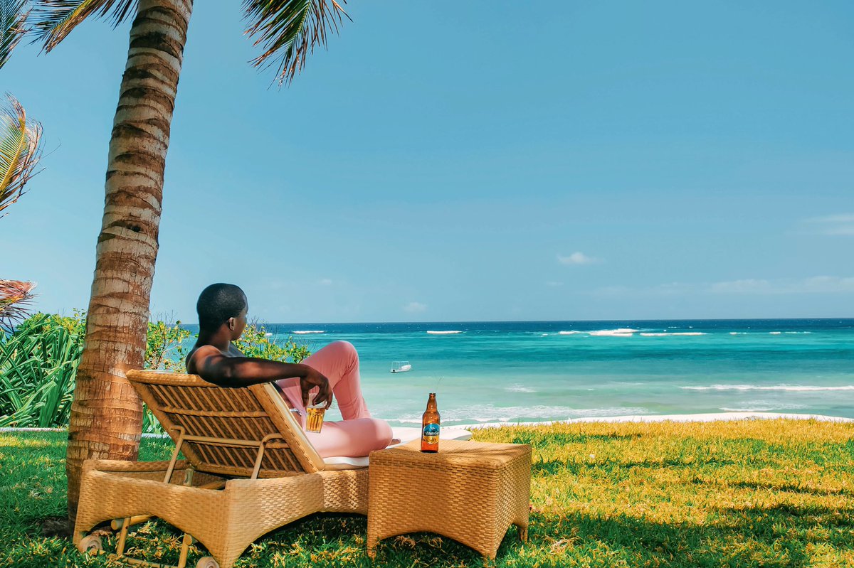 theMagunga's tweet photo. Gentle breeze on your face, different shades of blue crashing on the white sands. A palm tree shading your thoughts, and a cold beer in hand. 

Now that’s a memory. 

#ALegacyOfPerfection #PaidPartnershipWithDiageo
#NowTravelReady https://t.co/Rmh1zifMnm