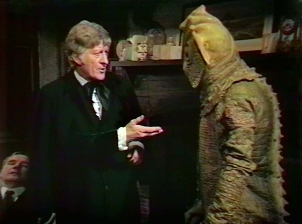 Doctor Who And The Silurians. The Doctor offering the hand of friendship. Somewhere in his subconscious, an irate little man is yelling "No, blow it up!".