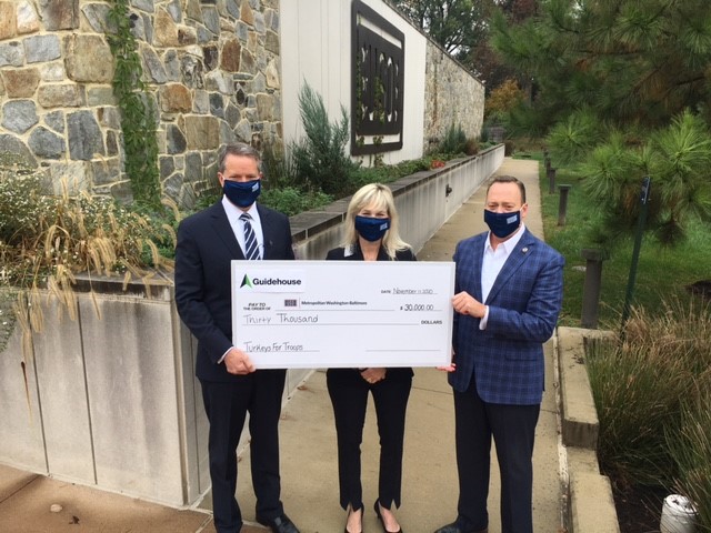 Guidehouse's tweet photo. We were honored to sponsor and participate in the @USOMetroDC #TurkeysforTroops donation drive to thank and support the military community! Scott McIntyre, Guidehouse CEO, presented our donation to support military families. https://t.co/GIoBmp6lUb