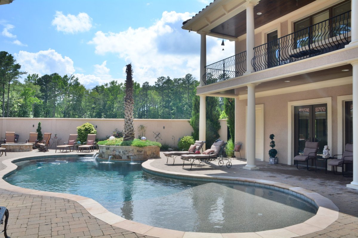 Check out Bold Construction's Charming Maida Vale Custom Home! This marvelous Mediterranean Style home features a central courtyard with a custom pool and outdoor bar! See more photos of this home and others like it by clicking the link below. buildboldnc.com/1063-2/