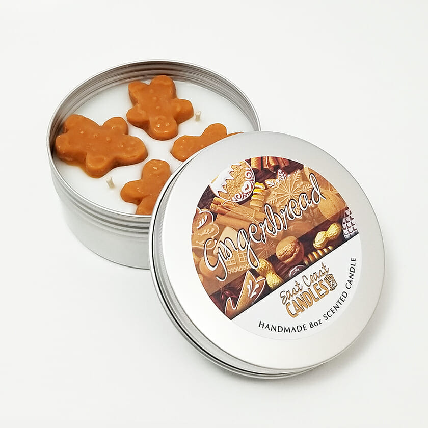 eccandles's tweet photo. Today's feature candle is our Gingerbread Candle Tin. Enjoy the sweet and spicy scent of fresh-baked gingerbread cookies by burning this adorable handmade candle. Little gingerbread men, cookie-shaped chunks make this candle look good enough to eat! https://t.co/nxbUmfEEoU https://t.co/V0WUQfKc0k