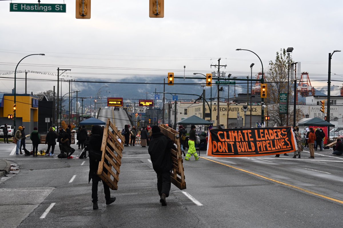 MarksGonePublic's tweet photo. Large section of Hasting street closed again. Blocking access to the port. @NEWS1130Traffic Hastings St. & Clark Dr. closed. I don’t see them going anywhere anytime soon. #stopkindermorgan https://t.co/MsAsnVFIoV