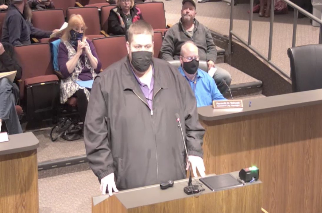 "It's time to stop being part of the problem," Jason Coan, who supports a mask mandate, tells the council.