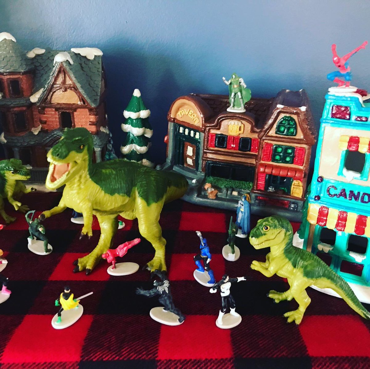 mrs_oio's tweet photo. Nerdy Holiday Christmas village is up! I love mixing traditional with nerdy themes. Plus dinosaurs!
#outsideisoverrated #nerdchristmas #christmasdecor https://t.co/of3xtfJAL9