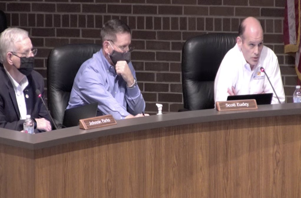 Vice Mayor Scott Eudey is trying to explain that business owners have the right to refuse business to anyone who isn't in a protected class.The commenter is saying not letting in maskless customers is anti-religious and anti-disability discrimination.