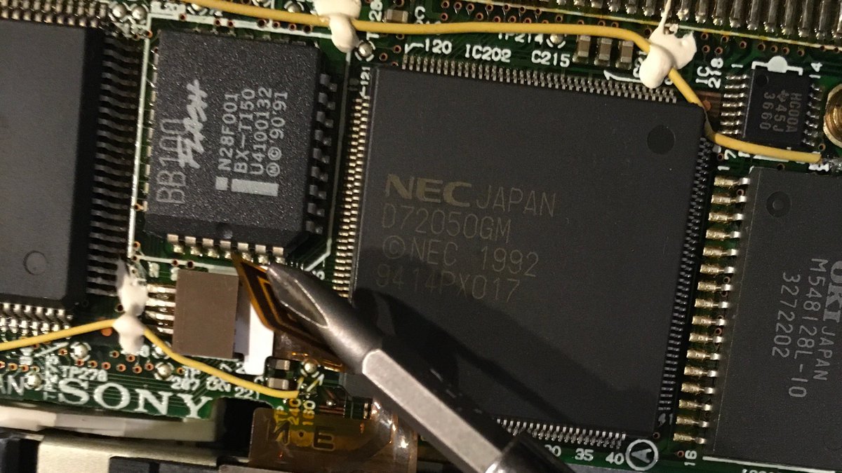 Under the ribbon. uPD72050gm.. hmm few references, but one reference to "NEC SEMICONDUCTOR SELECTION GUIDE 1995" In we go.
