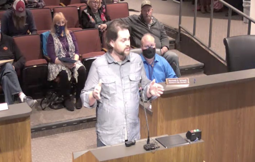 Vice Mayor Scott Eudey is trying to explain that business owners have the right to refuse business to anyone who isn't in a protected class.The commenter is saying not letting in maskless customers is anti-religious and anti-disability discrimination.