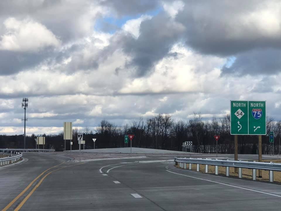 GBTPOLICE's tweet photo. The new Dort Highway extension is now open to all traffic. This includes the on and off ramps at I-75 and Cook Road. Please use caution when traveling this area for the first time. We now have, not one, not two, but THREE roundabouts to navigate! #RoundAndRoundAndRound https://t.co/7ByXJDxd7M