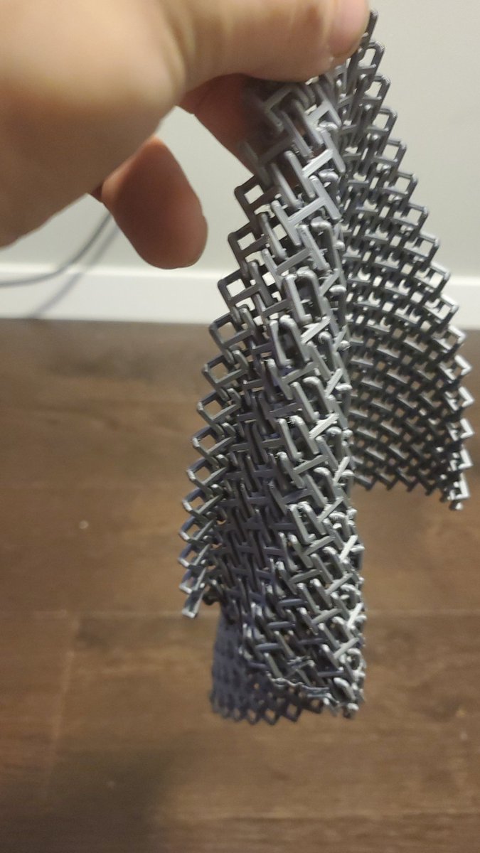 What about fabric? Can we print fabric? Look, it took 16 hours and had a couple of flaws, but it worked! OK, maybe more like chain mail, but still!