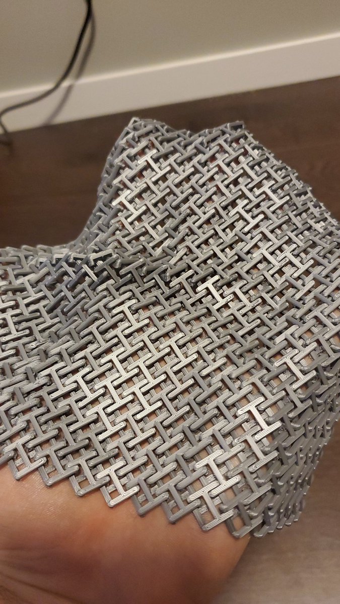 What about fabric? Can we print fabric? Look, it took 16 hours and had a couple of flaws, but it worked! OK, maybe more like chain mail, but still!