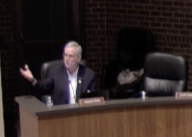 Councilor Parks says there's a chance the governor could put in a mandate. Crowd starts shouting him down."You have the right not to comply. I'm just saying a mandate could come from the governor if our numbers keep going up.""This is stupid!" someone yells.