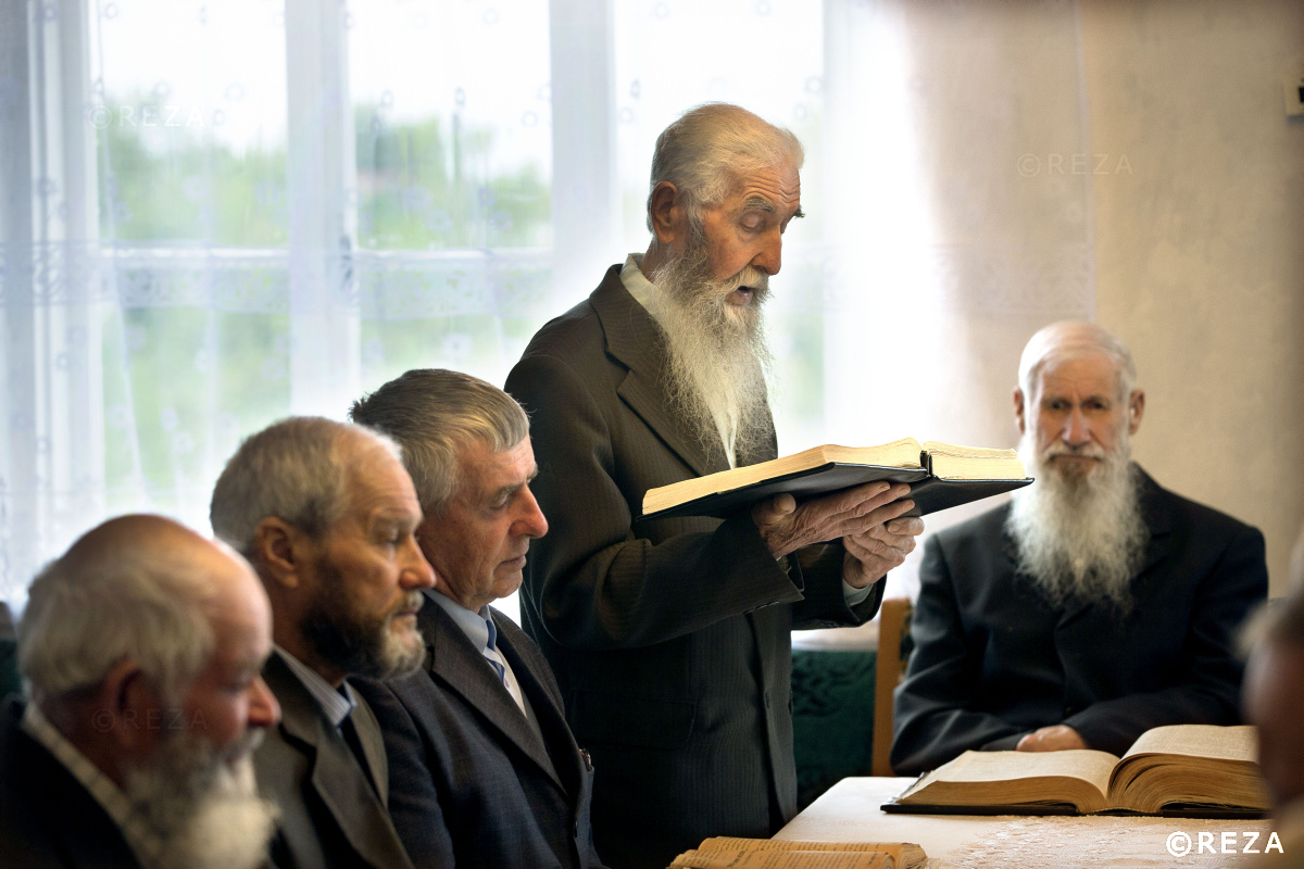 REZAphotography's tweet photo. INTERNATIONAL #BIBLE DAY 
At a Sunday service, the #Molokan pastor leads the traditional prayer. No icons or ornaments, they worship God. Refusing to adhere to the Orthodox Church's fast they were expelled from Russia. They preserved their 400-year-old way of life in #Azerbaijan https://t.co/KN2IgieMSL