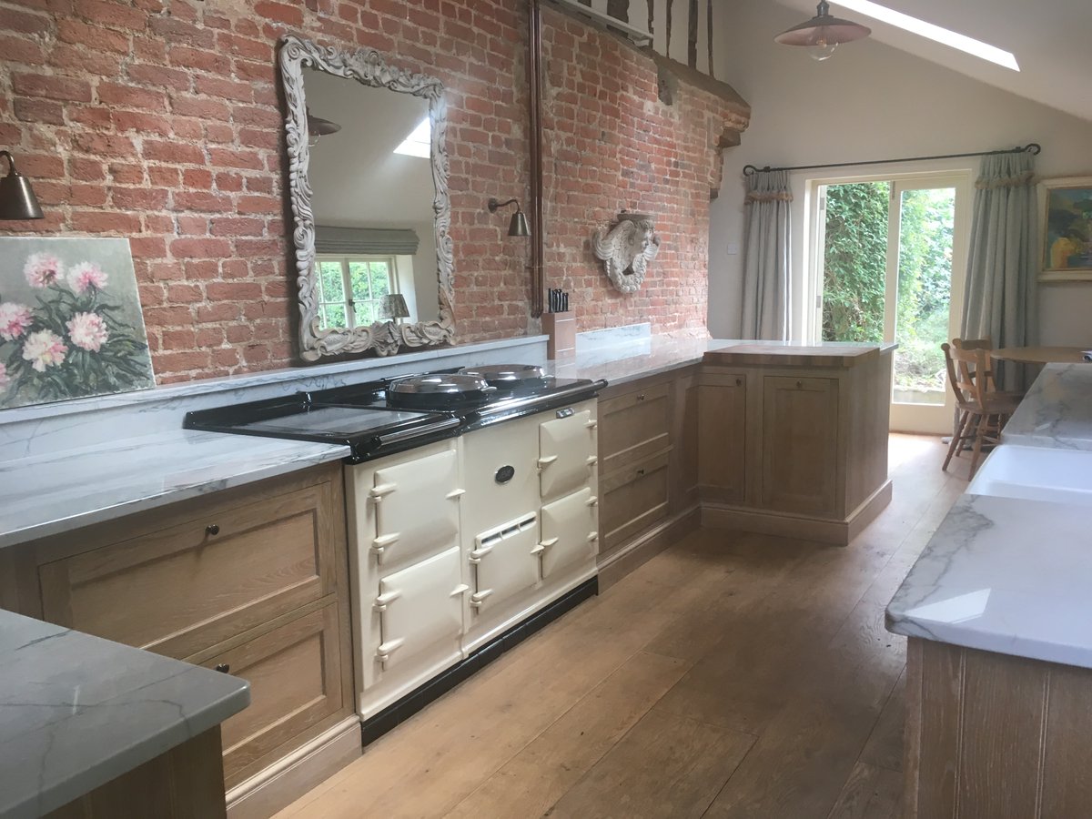 Our 'Auricular' mirror bouncing the light around this new kitchen - pleased with the natural finish of the frame against the brickwork #interiordesign #interiors #kitchen #framing #antiques #percevaldesigns #mirror #homedecor