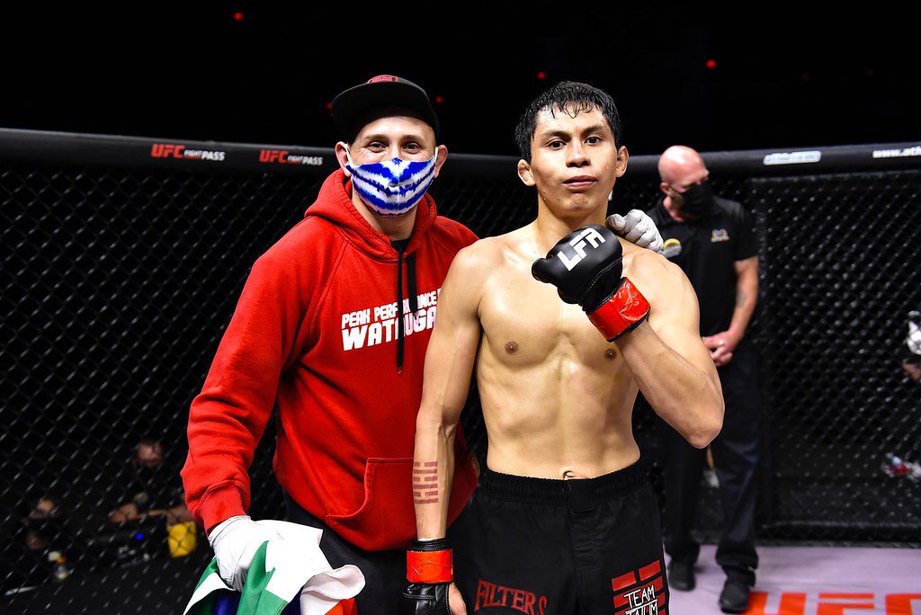 LFAfighting's tweet photo. That moment when you realize you are now @LFAfighting's all-time wins leader! 💯
Congrats to #VictorAltamirano on his record-breaking eighth victory inside the @LFAfighting Octagon. 👏
He did it in style with a #TriangleChoke at #LFA95! 🔺
#MMA
#LFANation
@UFCFightPass https://t.co/m0tFaGKr7U