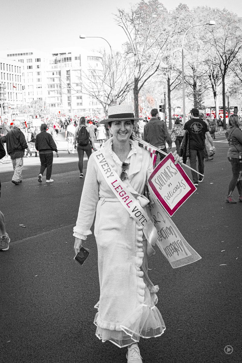 Women dressed as suffragettes walked through the crowds with signs that read "Soldiers in Petticoats" while wearing banners that read "EVERY LEGAL VOTE"."EVERY LEGAL VOTE" is a racist dog-whistle, targeting areas like Detroit, claiming some Black votes were illegal.