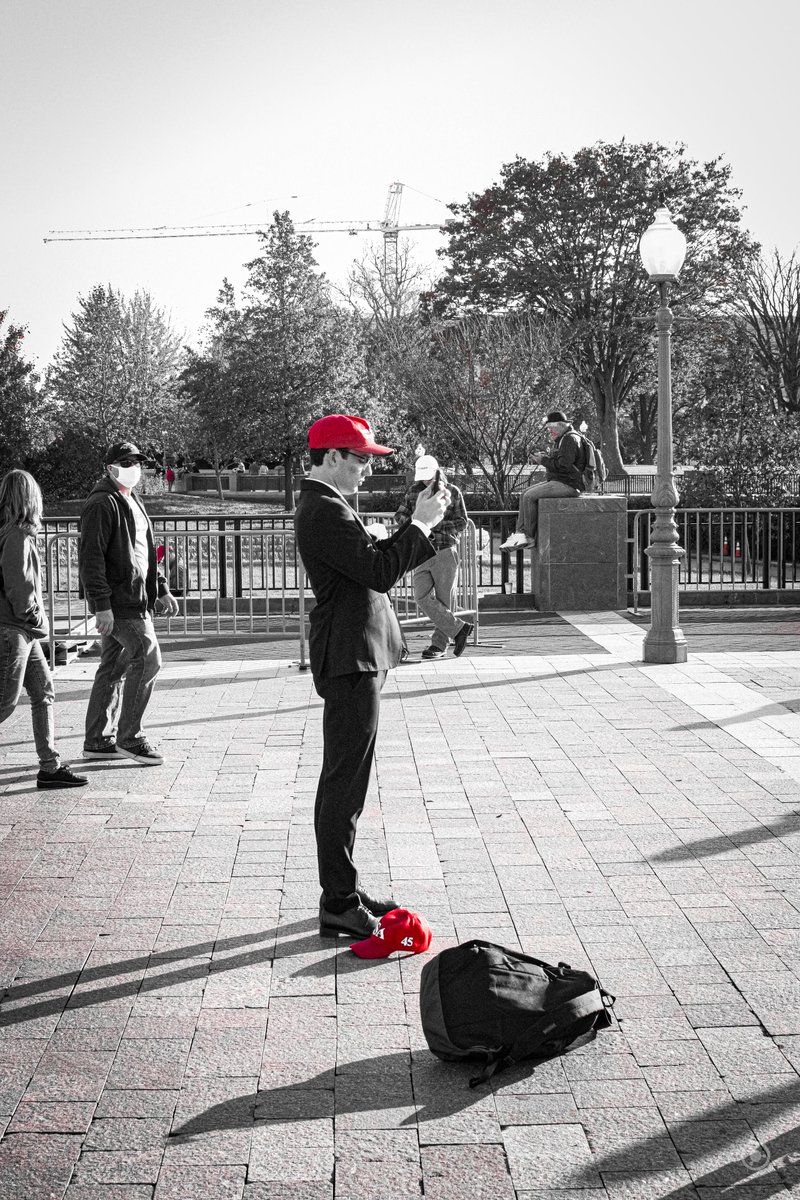 This young man in lifted heels kept taking pictures of himself, then switching hats, and taking more pictures of himself.I thought he was being super vain, but then a friend of mine pointed out that often this gets done to appear as if photos are from multiple days.