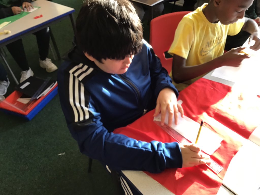 StCuthbertsPrm's tweet photo. In St Tathan, we cut our fabric to create our fantastic Christmas stockings. #sttathan @CSCJES @CSC_ExpArts https://t.co/ck3hOPxos0