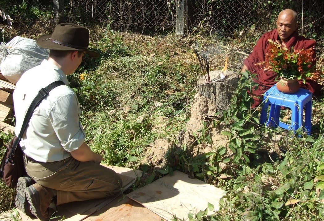 The Wargaming team wanted their work to respect the history &amp; culture of Myanmar. This included the Buddhist tradition which underpins life in much of the country. Here monk Po Po blesses the site with Wargaming's Tracy Spaight.#BuriedInBurma [Andy Brockman]