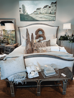 Who says Christmas can't be the last thing you see after a long day? This bedroom offers the perfect touch of Christmas! #christmasbedroom #christmasdecor #christmas #shoplocal #visithalycon