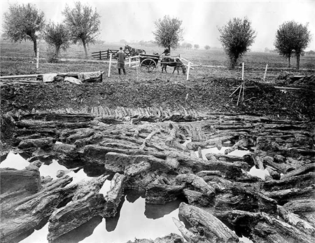 This was discovered by Arthur Bulleid in 1892, resulting in the excavation of much of the settlement and its enclosing palisade was between 1892 and 1907. 5/: Photo from the original excavations.