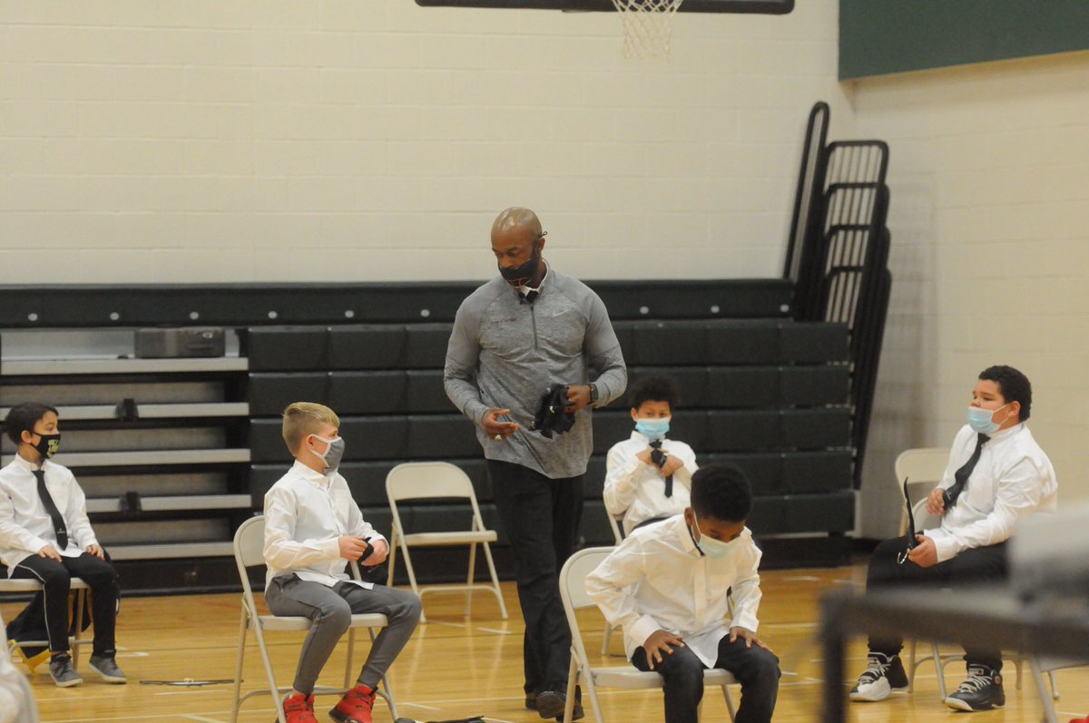 CCS_District's tweet photo. Gibbs students are now a part of the growing group of "Guys With Ties!" Akron University Assistant Football Coach @CoachJordan82 , a former Ohio State Buckeye and standout for the Massillon Tigers, expanded his program to Gibbs with a special ceremony on Monday. https://t.co/vNqK8Ti2eu