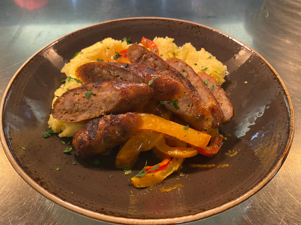 RedRabbitMN's tweet photo. We are still celebrating the reopening of the North Loop location! Dine-in may be closed, but you can still order the fire-themed menu features for pick-up or delivery. Available through Nov. 30th. Open 11am-9pm. 
📸: Smoky Sausage &amp; Polenta https://t.co/vQ54xh3xqB